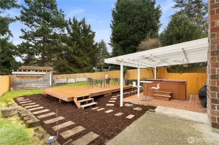 Covered patio and hot tub