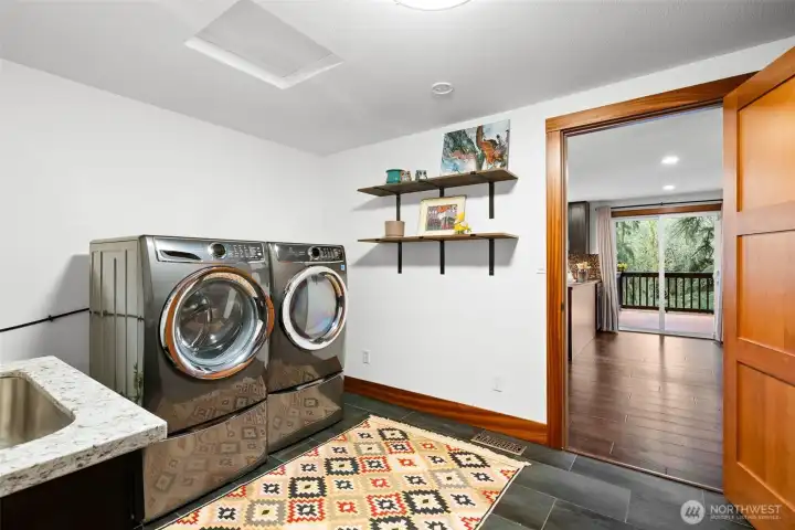 Handy laundry or mudroom off garage
