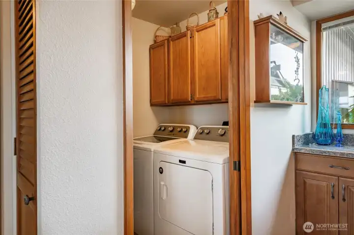 Utility adjacent to bedroom hallway