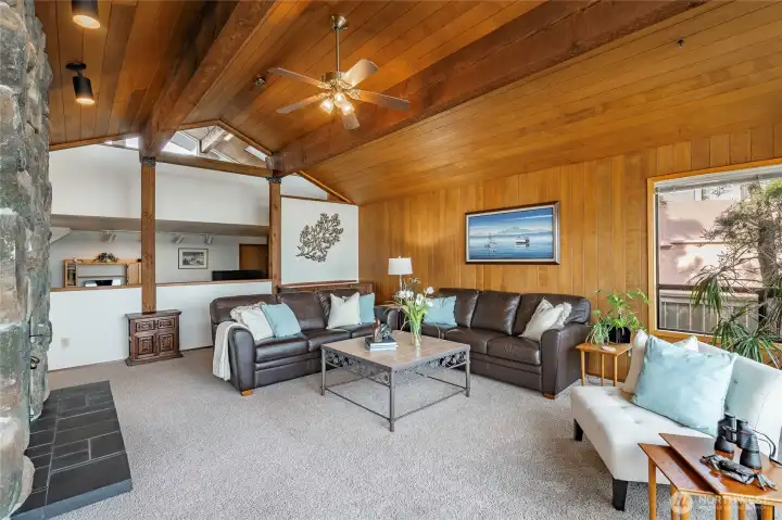 Living room facing the den and loft space