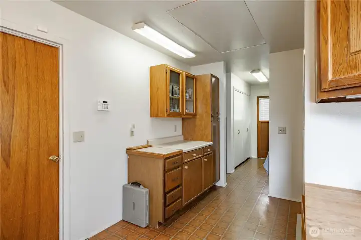 Gardening/Mud room between the ADU and the garage for plenty of storage or separate entry to ADU