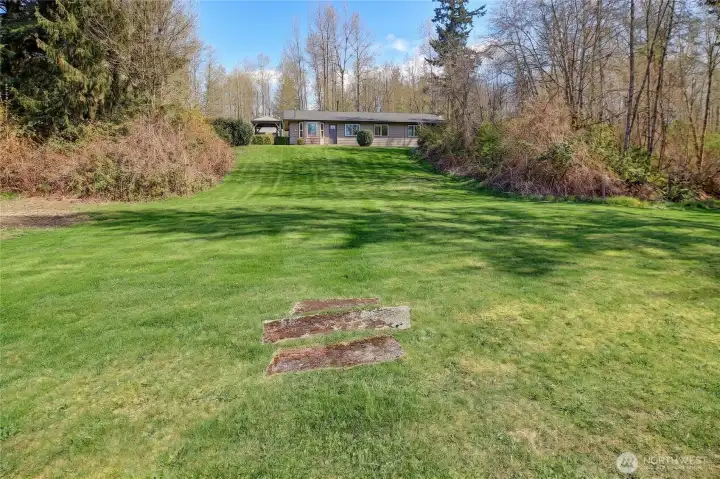 From Pastures the Lawn Flows up to Home~