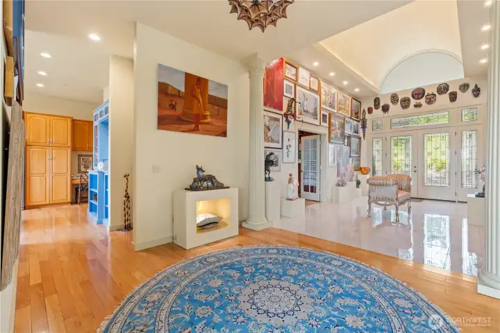 Another shot deeper into the entry area. Kitchen is down the hall and dining room is out of view to left.