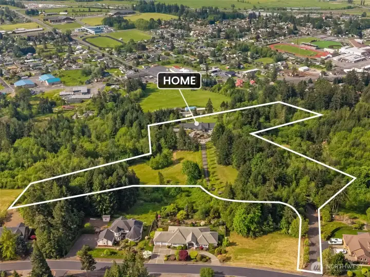 This photo shows the road into the property.  Aerial photo slightly distorted because of topography.