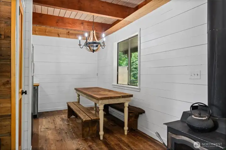 Cozy, wood stove and dining room!