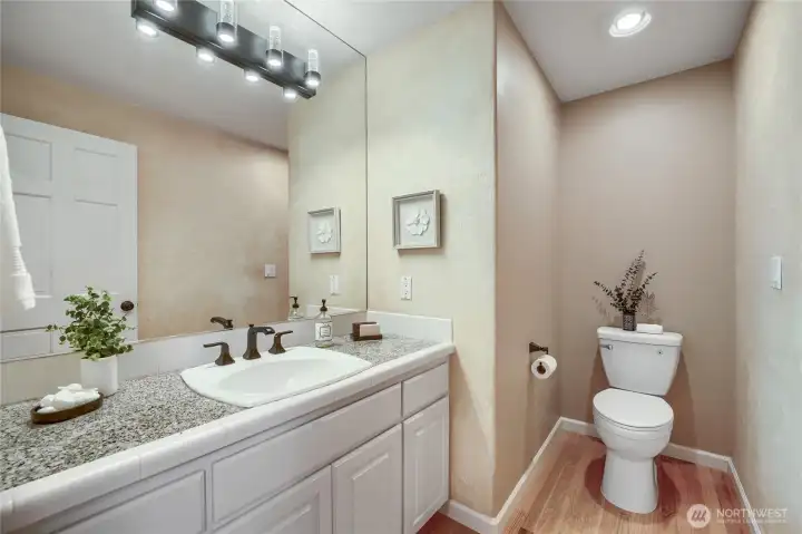 Quartz countertops in the bathrooms.
