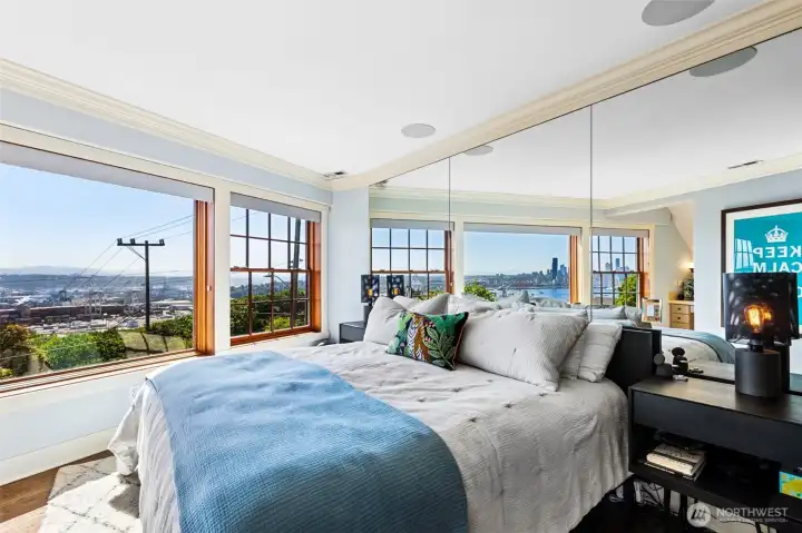 Luxurious primary suite features some of the best views in West Seattle - from the space needle to Mount Rainier. Unobstructed views of the downtown lights, ferries, stadiums and more.