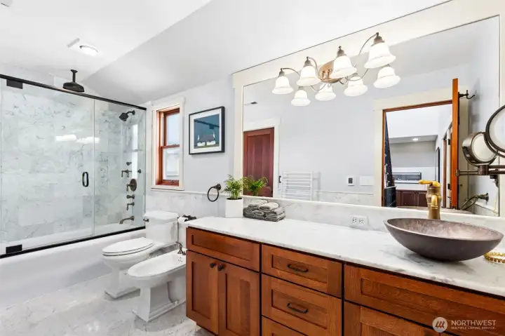 Guest bathroom on the 2nd floor features heated floors and towel rail, multi-jet shower with overhead, rain and front high flow jets, bidet.