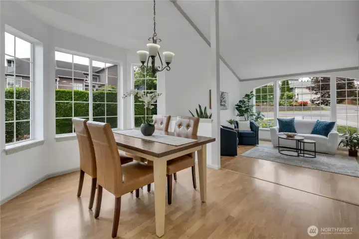 Looking from the dining room into the living room- love all the natural light.
