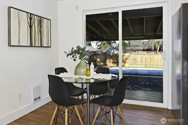 Dining room opens to large covered deck, for 3-season entertaining.