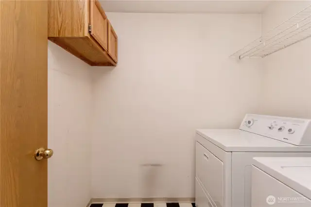 Laundry room and cabinets.