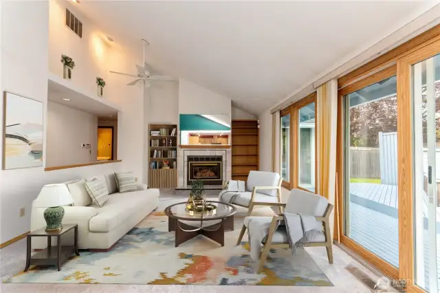 Virtually staged family room. Viewed from the kitchen.