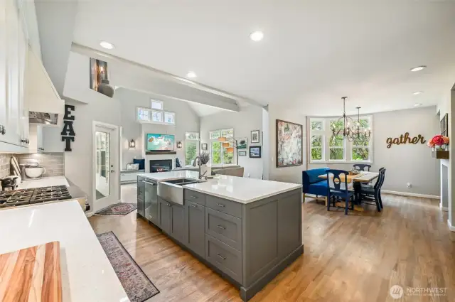 You'll love having friends and family over to enjoy the beautifully remodeled kitchen and great room. All new cabinetry, quartz counters, tile backsplash, appliances and hood. Everywhere you look you see the outdoors.