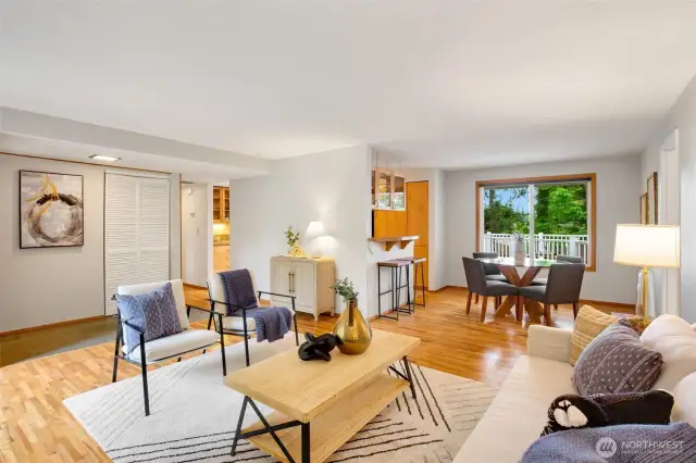 Pleasant dining space with a view of the tree lined backyard.
