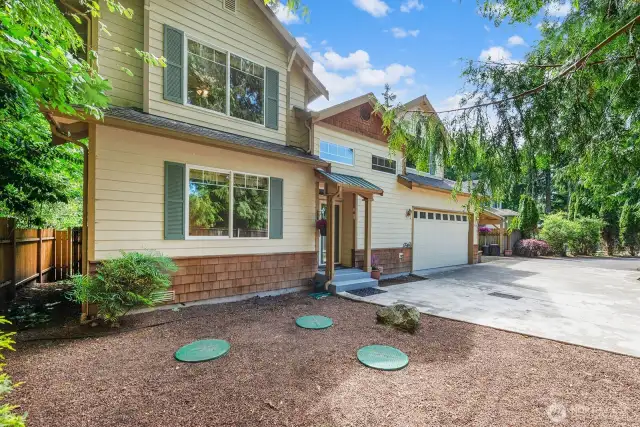 Home boasts 2 car garage and covered car port.