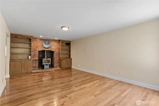 Cozy with its wood fireplace, this room is designed to nestle in!