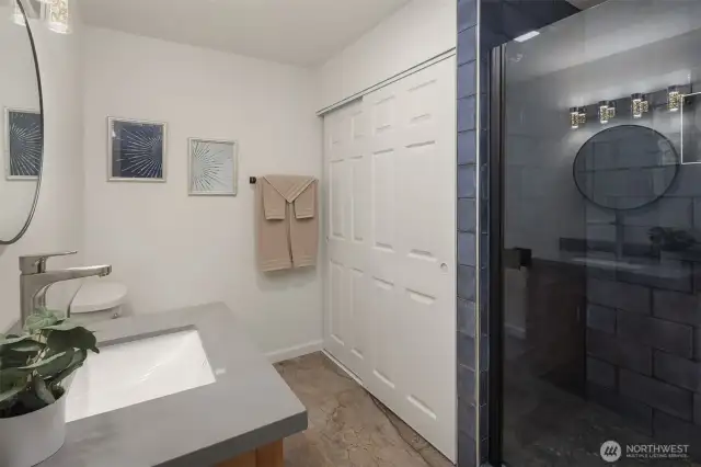 Bathroom/Laundry Room off 2nd Entrance and Kitchen.