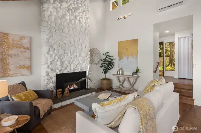 Living Room - Gas Fireplace and Vaulted Ceilings with Additional Windows for Added Sunlight