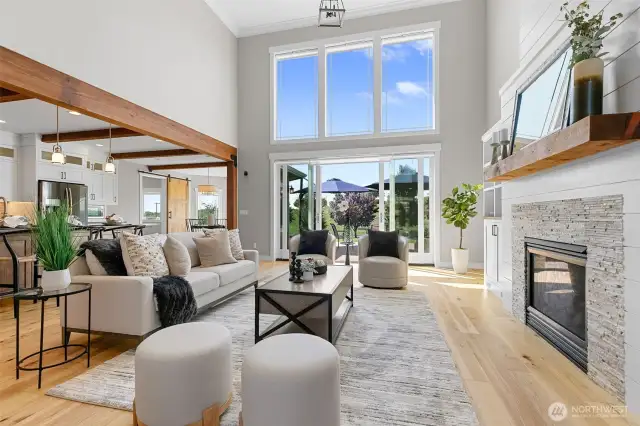 A vast, open floor plan creates the perfect central gathering space for living and casual dining.