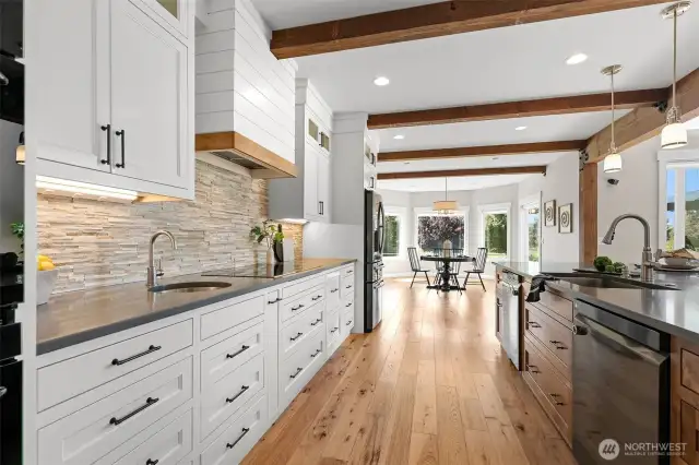 Two dishwashers, a free standing ice maker, induction range and casual dining!