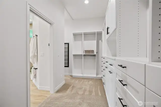 The primary suite closet boasts all the space you will need!