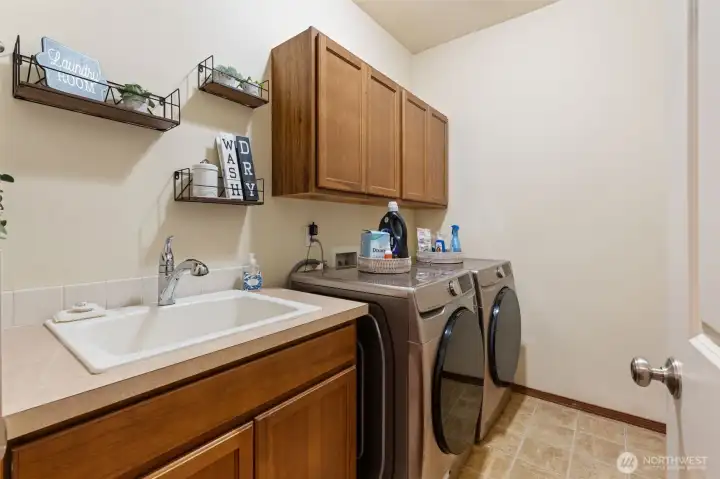 Utility room with cabinets for storage