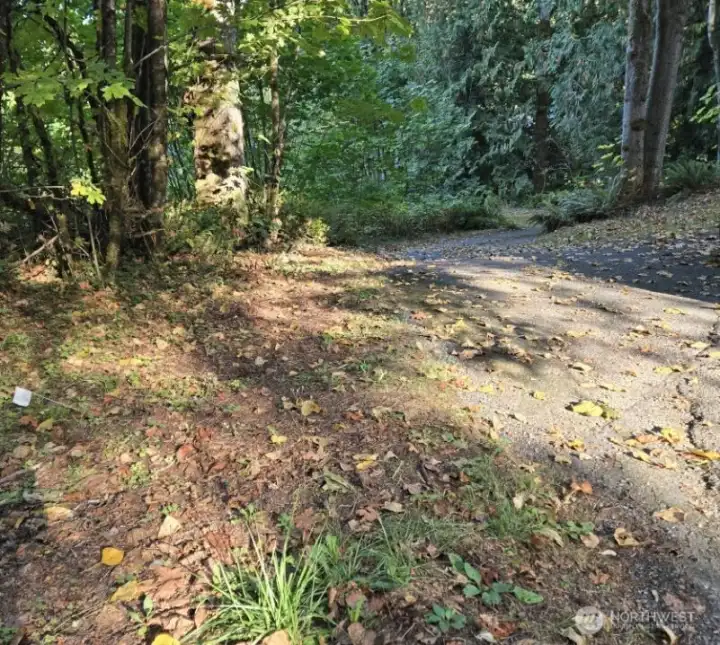 Continue down shared driveway to view property.