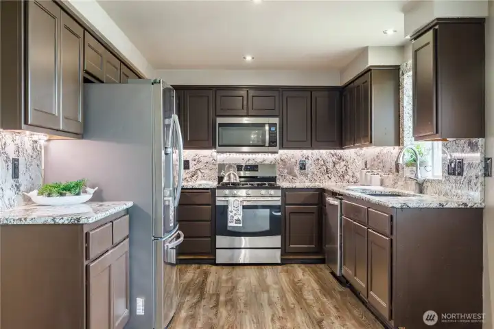 Room for several people helping make dinner