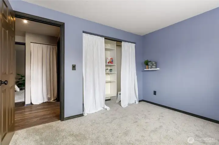 Bedroom #2 has sizable closet with built in organizers.  In the hall is another linen closet next to the main bath