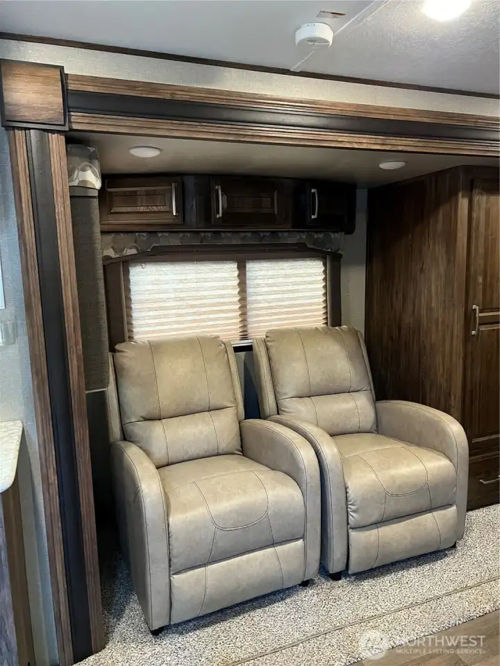 Reclining chairs inside the trailer.