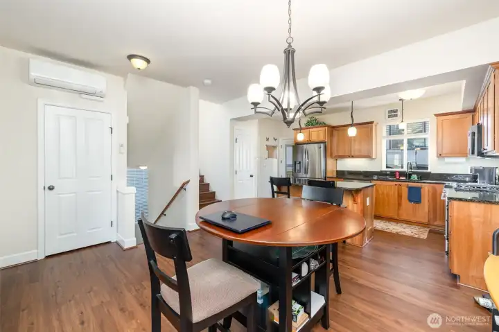 Main level boasts an open floor plan with LVP flooring, where living, dining & kitchen flow seamlessly together.