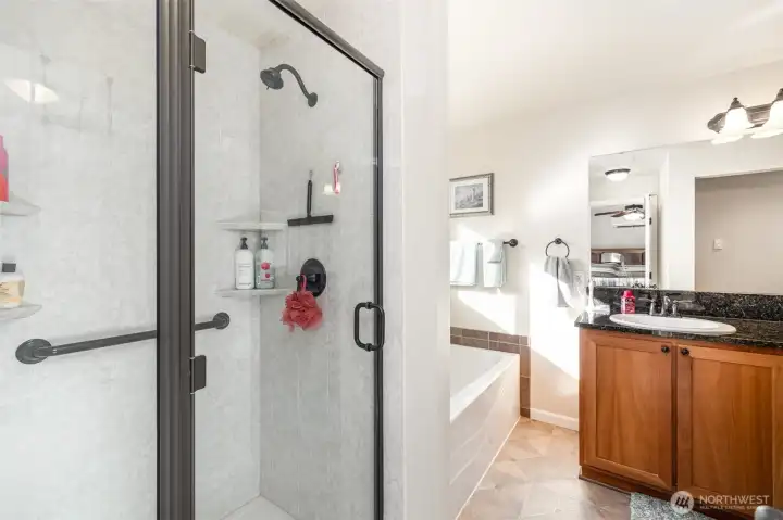 Private 5 piece en-suite bathroom. Walk-in shower was upgraded last year to ensure low maintenance cleaning.