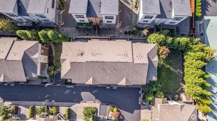 Great aerial view of Hillcrest Village, notice the convenient guest parking space just steps from the unit.
