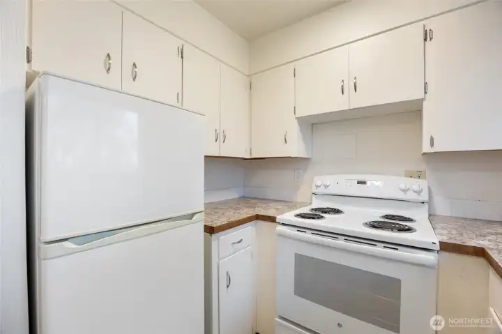 Kitchen with fridge and stove