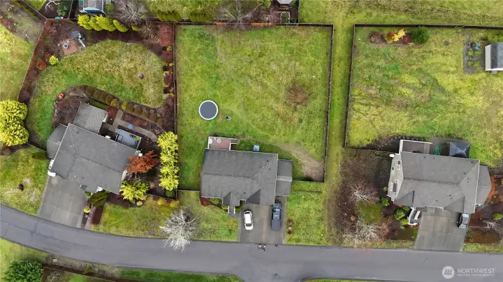 Community field access path to the south of the property