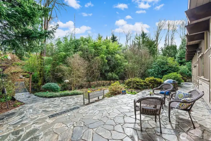 Large private patio ideal for entertaining, outdoor meals, birdwatching, or just sitting to listen to the creek. Another space with endless possibilities!