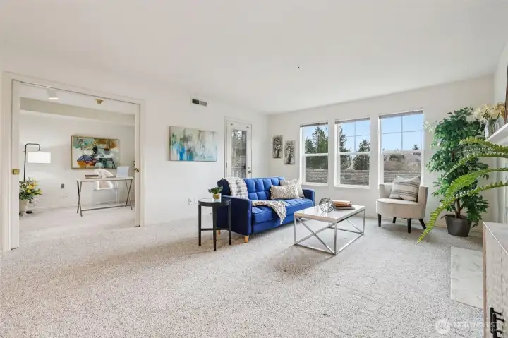 2nd bedroom is to the left and would be great for a media room, guest room, den, craft room.