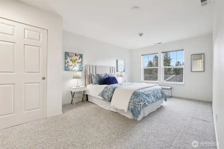 Primary Bedroom is light and bright with plenty of space for larger furnishings.