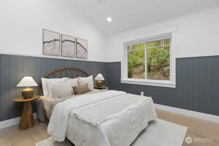 Bed #2 with painted wainscoting that honors timeless farmhouse character.