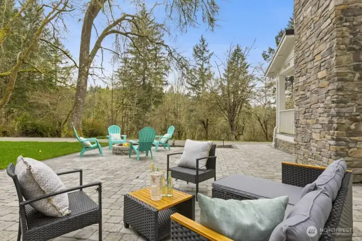 New paver patio creating a perfect outdoor gathering space.