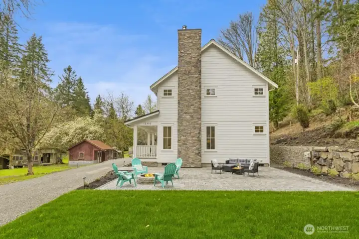 Vibrant green lawn adds to the park-like setting.
