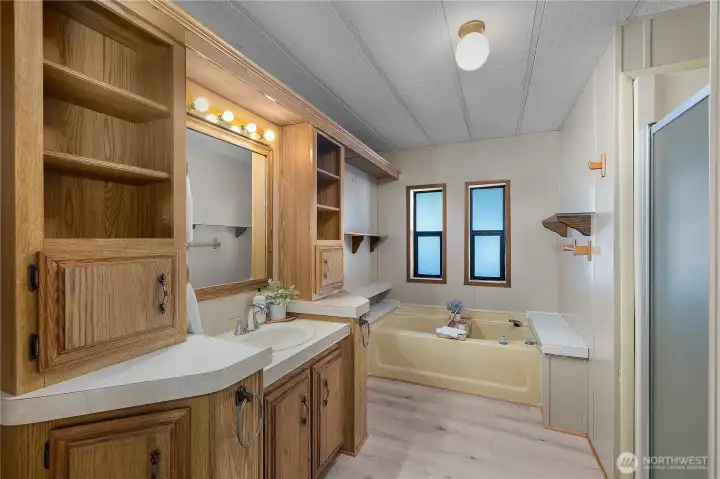 En-suite bath complete with soaking tub and separate shower.