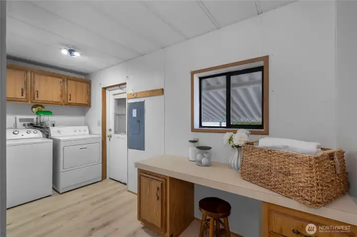 Oversized utility room with more space than you’ll know what to do with. Washer and Dyer included.