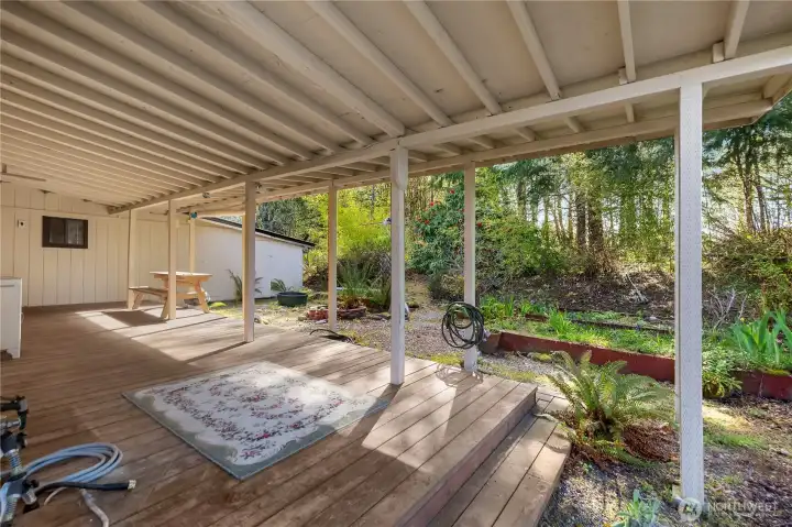Fully covered back deck and private backyard for year round enjoyment.