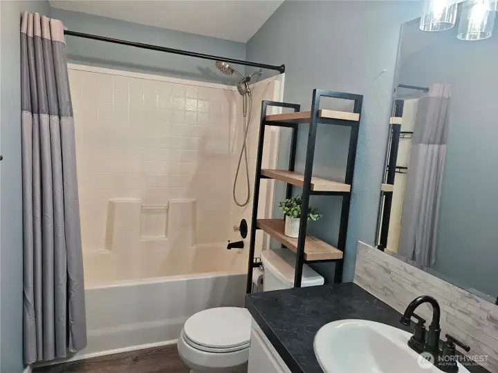 There's a full bathroom in the hallway too.