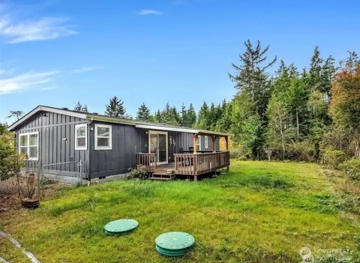 Back yard is low-maintenance mow-n-go and fenced.