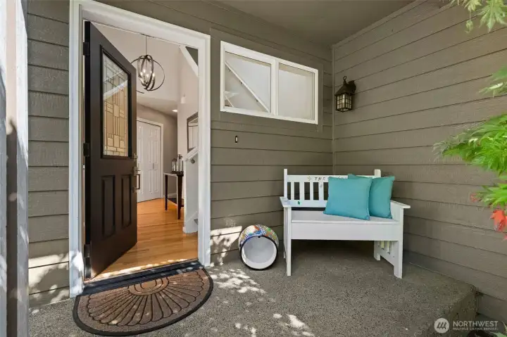 Warm and inviting entry with covered porch. Warm and inviting entry with covered porch.