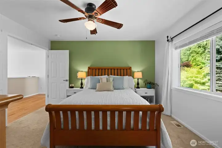 Expansive primary bedroom offers a functional layout and relaxing atmosphere. Expansive primary bedroom offers a functional layout and relaxing atmosphere.
