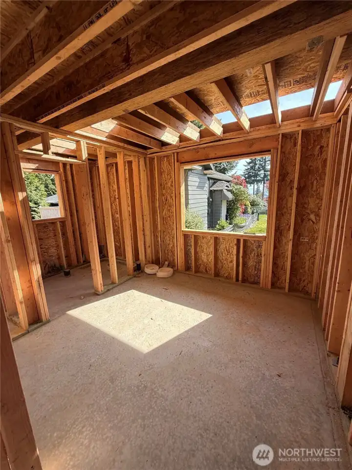 3rd bedroom, framed in (ground floor). Ensuite bathroom will feature curbless shower.