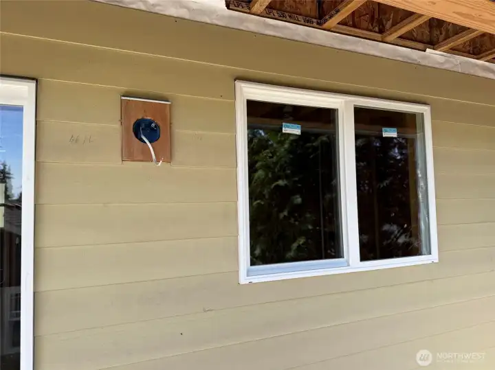 cCoseup of cement board siding, seen from deck